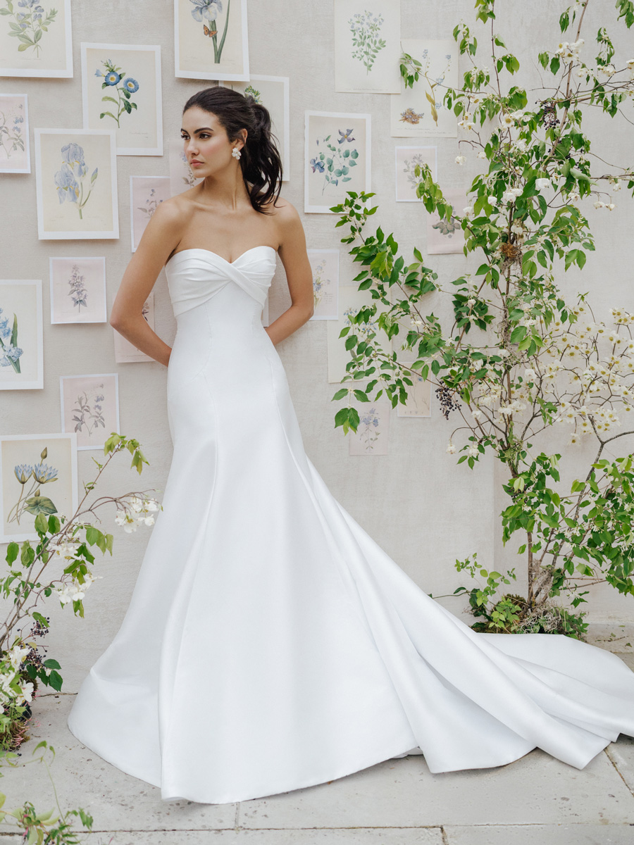 Woman in unique Love Couture Bridal Wedding Dresses.