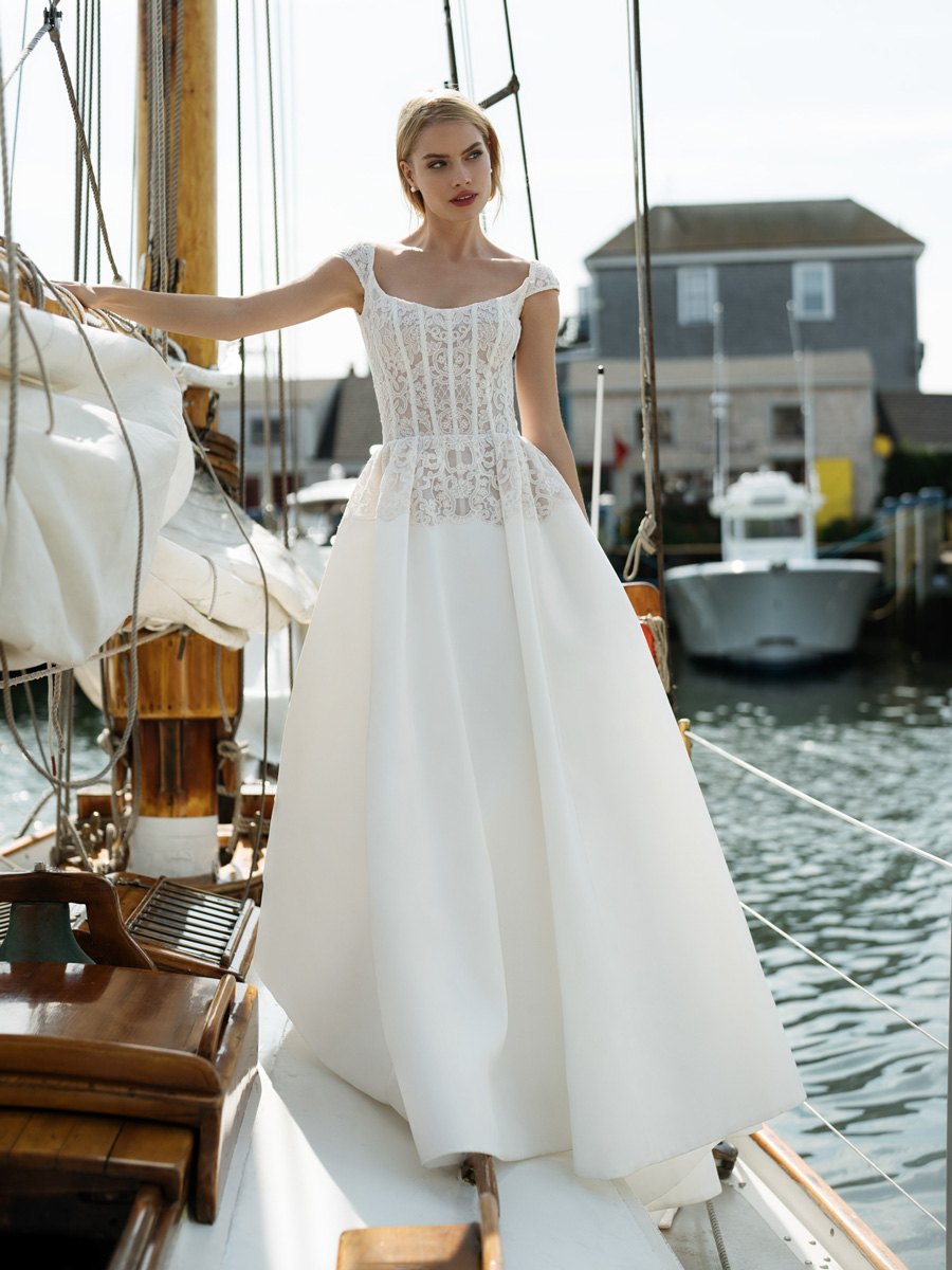 Woman in enchanting Love Couture Bridal Wedding Dresses.