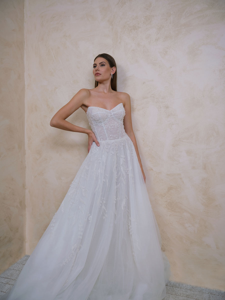 Love Couture Bridal Wedding Dresses Bride modeling luxurious Wedding Dresses.