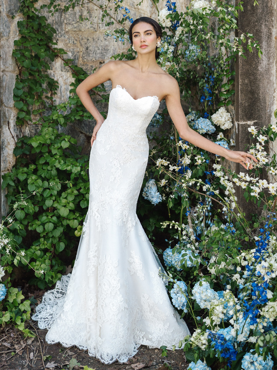 Love Couture Bridal Wedding Dresses Lady flaunting classic Wedding Dresses.