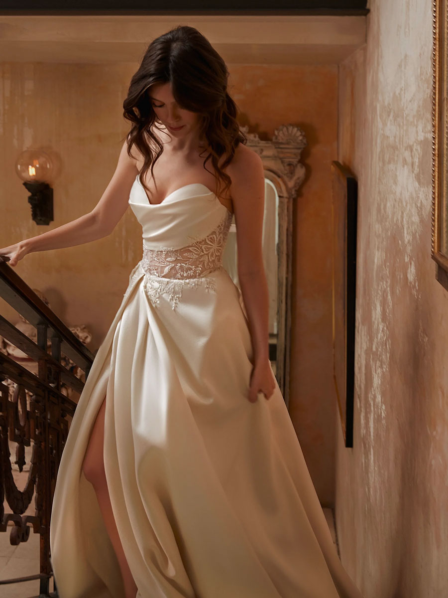 Love Couture Bridal Wedding Dresses Lady in a glamorous, couture Wedding Dresses.