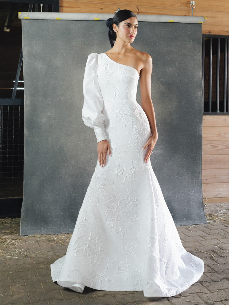 Love Couture Bridal Wedding Dresses Bride in a minimalist, elegant Wedding Dresses.