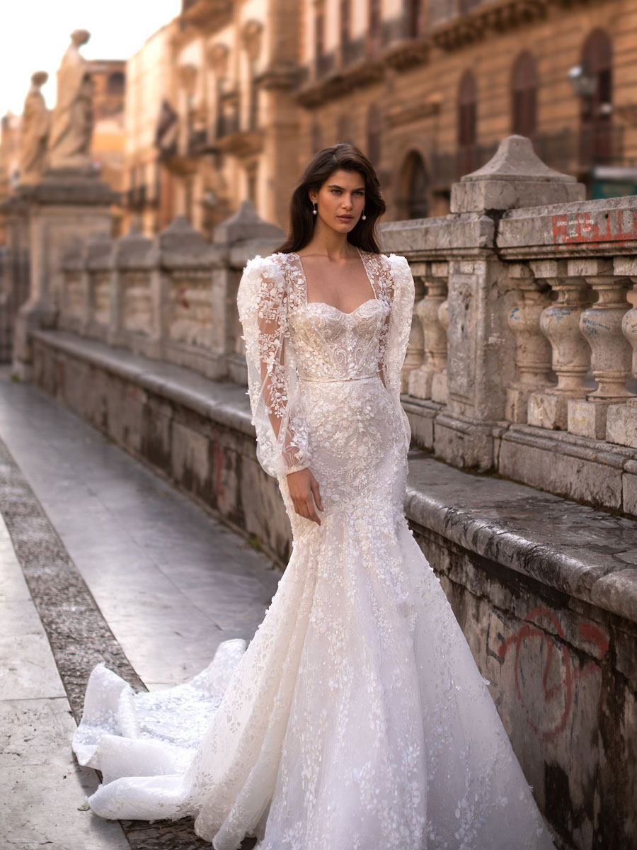 Love Couture Bridal Wedding Dresses Woman in romantic Wedding Dresses.