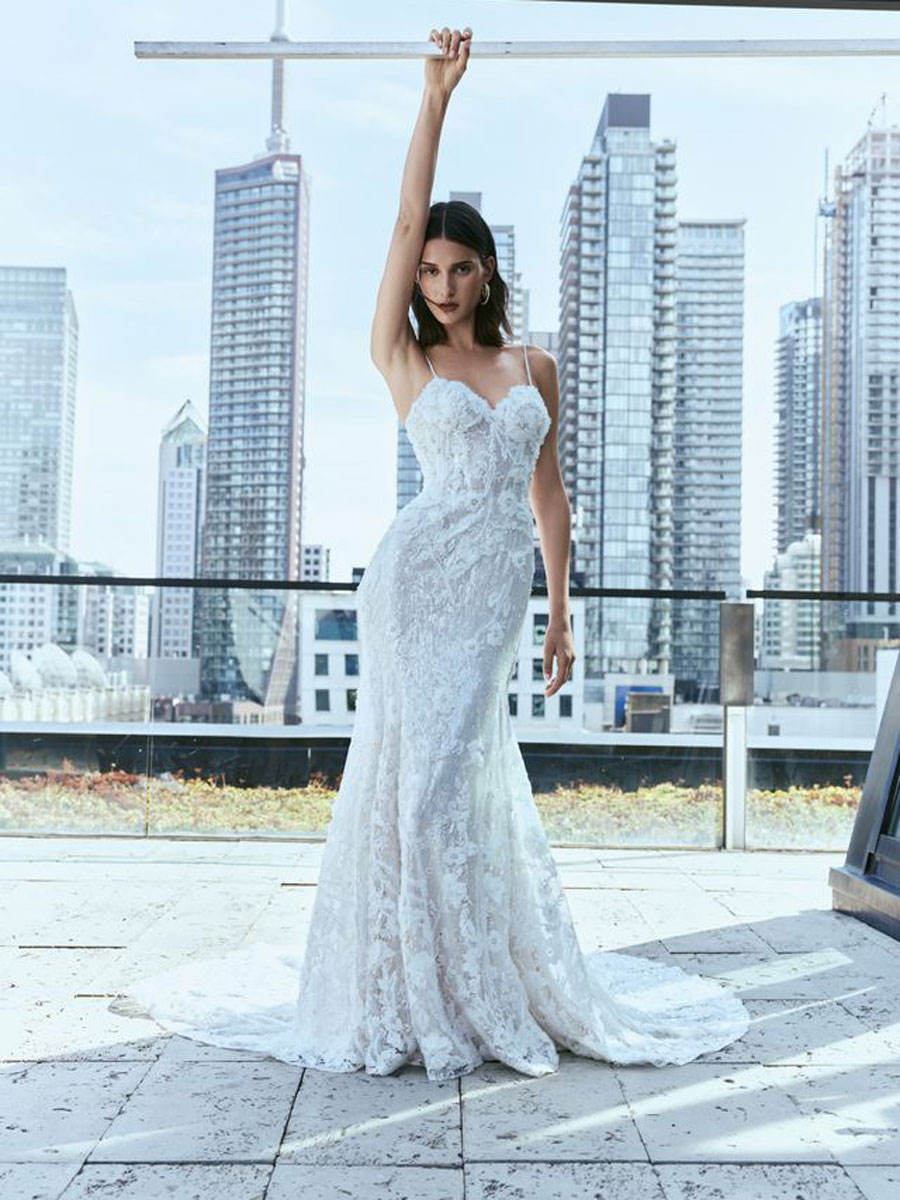 Love Couture Bridal Wedding Dresses Lady in regal Wedding Dresses.