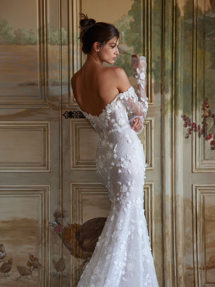 Love Couture Bridal Wedding Dresses Lady in opulent Wedding Dresses.