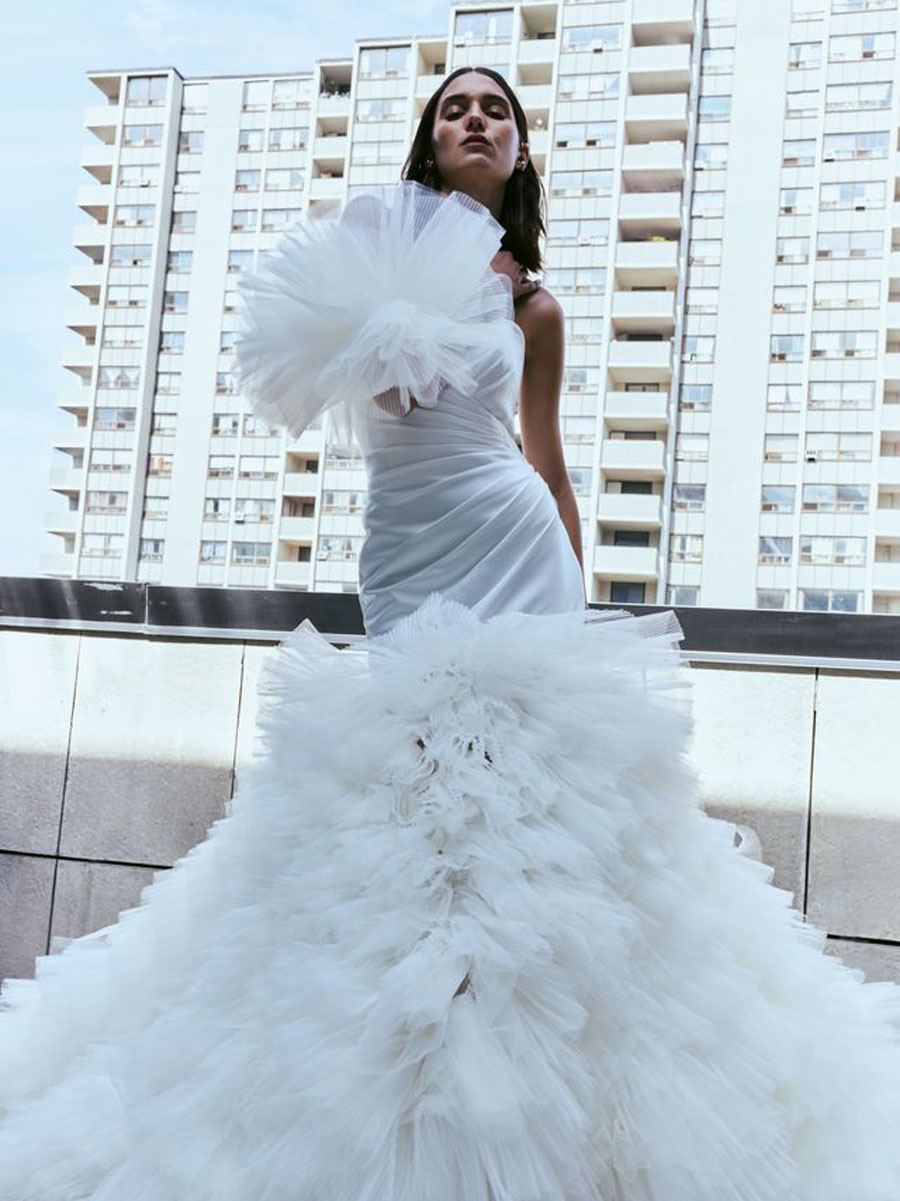 Love Couture Bridal Wedding Dresses Lady showcasing detailed Wedding Dresses.