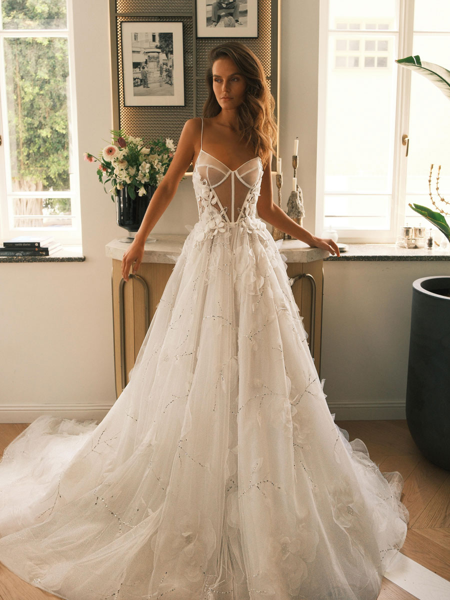 Lady in a classic, sophisticated Love Couture Bridal Wedding Dresses.