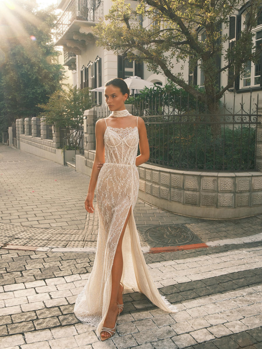 Lady flaunting an intricate, floral Love Couture Bridal Wedding Dresses.