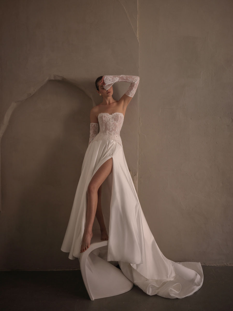 Bride in a glamorous, refined Love Couture Bridal Wedding Dresses.